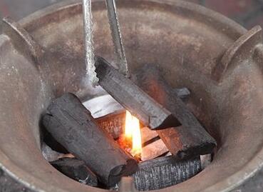 how to light charcoal without lighter fluid?